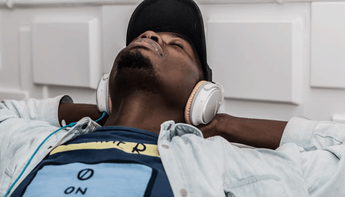 Man listening to music with his headphone